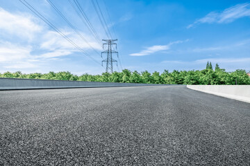 Sticker - Empty asphalt road and electricity pylons on sunny day