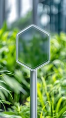 Poster - Hexagonal Glass Signpost With Green Foliage Blurred Background.