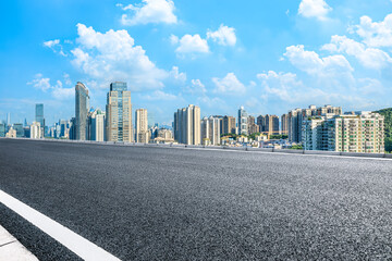 Sticker - Empty asphalt road and cityscape with skyline in modern city