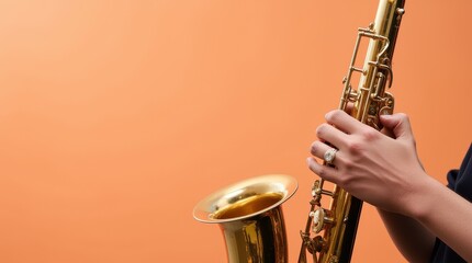 A musician playing a gold saxophone during a jazz performance, isolated with focus on the brass instrument