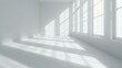 © Nam Sara - bright, minimalistic interior space with white walls and large windows allowing sunlight to create soft shadows on floor. serene atmosphere evokes sense of calm and openness