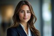 © Imagentive - Confident Businesswoman in Suit, Direct Eye Contact