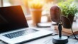 © AH TAR STOCK - Home studio podcast interior. Microphone, laptop and on air lamp on the table, close-up