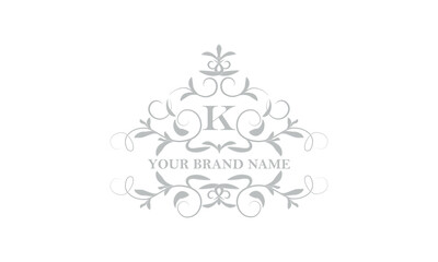 Wall Mural - Creative floral design of the company logo with a stylish letter K in the center. Vector sign for business, fashion, restaurant, hotel, etc.