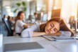 © DigitalMagicVisions - Young Worker Resting at Desk in Office Environment