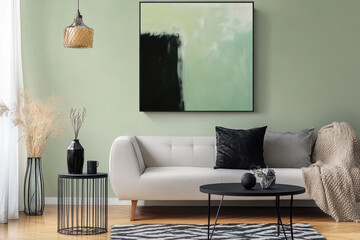 Wall Mural - modern living room featuring stylish sofa, decorative pillows, and striking abstract painting on wall. calming green backdrop enhances cozy atmosphere, making it inviting and serene