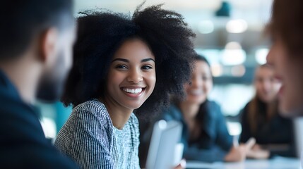 Wall Mural - Smiling Woman with Afro Hair in a Meeting