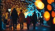 © acoustIcara - Family walking together under colorful holiday lights in a festive atmosphere.