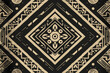 © Babb - Bold geometric shapes create a captivating visual display with intricate details in contrasting black and beige colors, showcasing exquisite craftsmanship and cultural inspiration