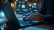 © wikkie - A person using a laptop with digital data visuals floating above the screen.
