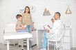 © Pixel-Shot - Little boy with mother at pediatrician's office
