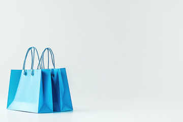 Blue shopping bag against a white background, clean and minimalist design.