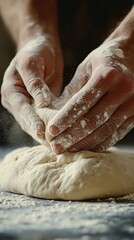 a fine looking bread dough on wooden table with two hands setting ready to knead above, a splash of flour, dark background