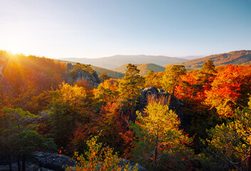 Aufkleber - Magical scene of forested slopes and distant mountain ranges. Dovbush Rocks, Carpathian mountains, Ukraine, Europe.