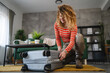© Miljan Živković - One woman pack suitcase baggage prepare for vacation holiday