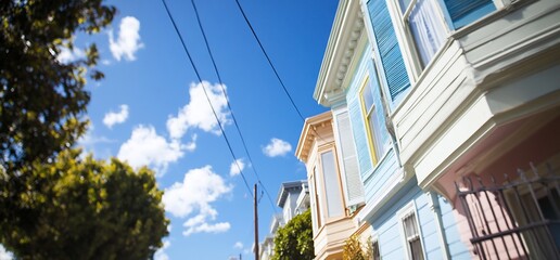 Wall Mural - Colorful Victorian style homes against a bright blue sky.