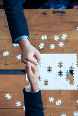 Vertical Horizon Implement puzzle improve solve synergy organize team building connection plan trust service strategy. Vertical Stakeholders business trust teams hands holding jigsaw puzzle synergy