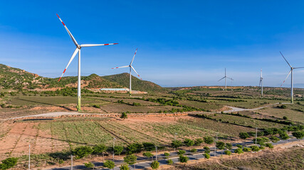 Landscape with Turbine Green Energy Electricity, Windmill for electric power production, Wind turbines generating electricity on field at Phan Rang, Ninh Thuan, Vietnam. Clean energy concept.