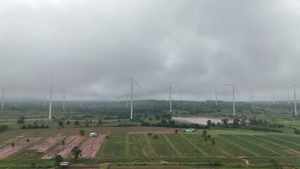 Wall Mural - large field with many wind turbines in the background