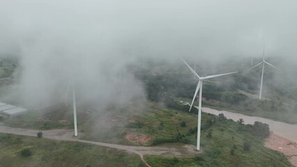 Wall Mural - large field with many wind turbines in the background