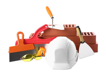 Sticker - Hard hat, red bricks, trowel, measuring tape, goggles and putty knives isolated on white. Building material and construction tools