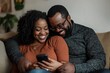 © ChaoticMind - A joyful couple sits together, sharing a hearty laugh while looking at a phone, showcasing love and happiness in a comfortable home environment with soft decor.
