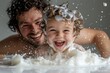 © FrameFlow - Father and son having fun with shaving foam, Generative AI