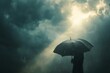 © ChaoticMind - A person with an umbrella stands in a mysterious ambiance, surrounded by stormy clouds and rainfall, light breaking through as a symbol of hope and resilience.