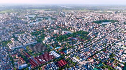 Wall Mural - Aerial view of Nam Dinh city with many houses, buildings and lakes