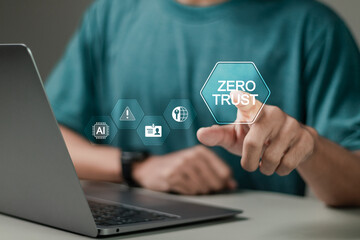 Zero trust security concept, Person using computer laptop with zero trust icons on virtual screen for business information security network.