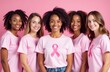 © yuntunen - Diverse women in pink ribbons, symbolizing unity for cancer awareness. Soft pink gradient background highlights their support. Ideal for health campaigns and awareness initiatives.