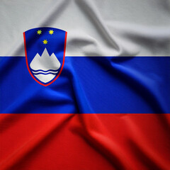 Republic of Slovenia flag waving in the wind. Cloth fabric texture ensign background. Use it for national day and country occasions concept