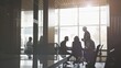 © Svetlana - Group of people are sitting around a table in a conference room