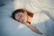 © Prasanth - Portrait of beautiful adorable girl lying sleeping enjoying sweet dreams white light room interior indoors