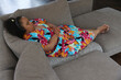 © Caia Image - Woman with Down syndrome taking nap