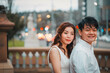 © Austockphoto - Young engaged couple embracing on the steps of the Old Treasury Building in Melbourne