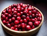 a close up of fresh market ready cranberries vaccinium macrocarpon perfect for holiday dishes