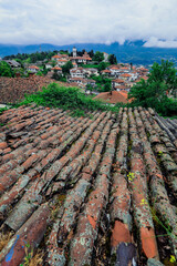 View of Ohrid\'s historic rooftops and picturesque buildings under a cloudy sky in Macedonia