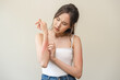 © Pormezz - Dermatology, asian young woman reaction from atopic, insect bites on her arm, hand in scratching itchy red spot or rash of skin. Healthcare, treatment of beauty.