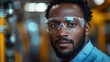 © Arti - Focused worker in safety glasses at industrial facility