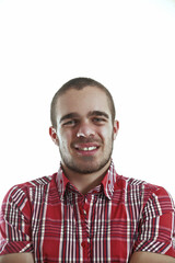 Young man smiling and posing on white background