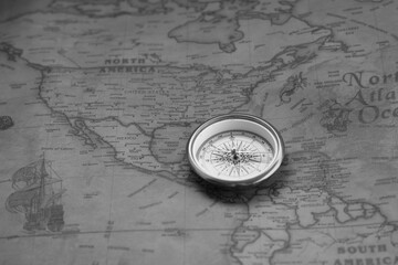 Wall Mural - classic round compass on background of old vintage map of world