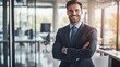 © WS Studio 1985 - Smiling Businessman in Modern Office Setting