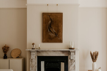 Warm minimalist interior with abstract artwork and victorian marble fireplace