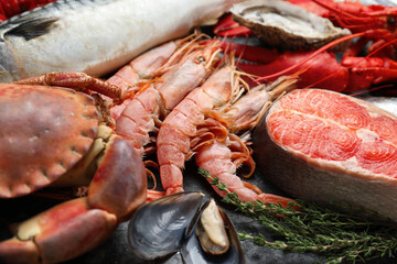 Poster - Fresh salmon steak, shrimps and other sea food on table, closeup