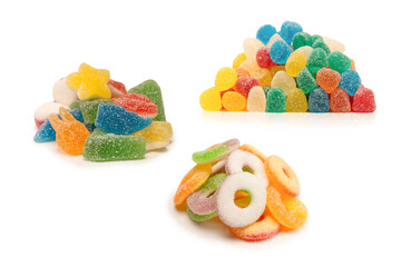 Wall Mural - Assorted gummy candies isolated on a white background. Top view.