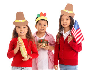 Wall Mural - Cute little children with USA flag and vegetables on white background. Thanksgiving Day celebration