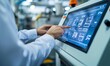 © Valentyna - Engineer using touchscreen to control production process in factory