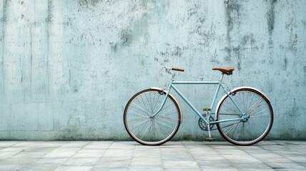 Wall Mural - A sleek bicycle parked against a minimalist urban backdrop, representing eco-friendly transportation and modern lifestyle, Urban scene