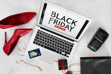 Wall Mural - Laptop with text BLACK FRIDAY SALE, credit card and accessories on light background